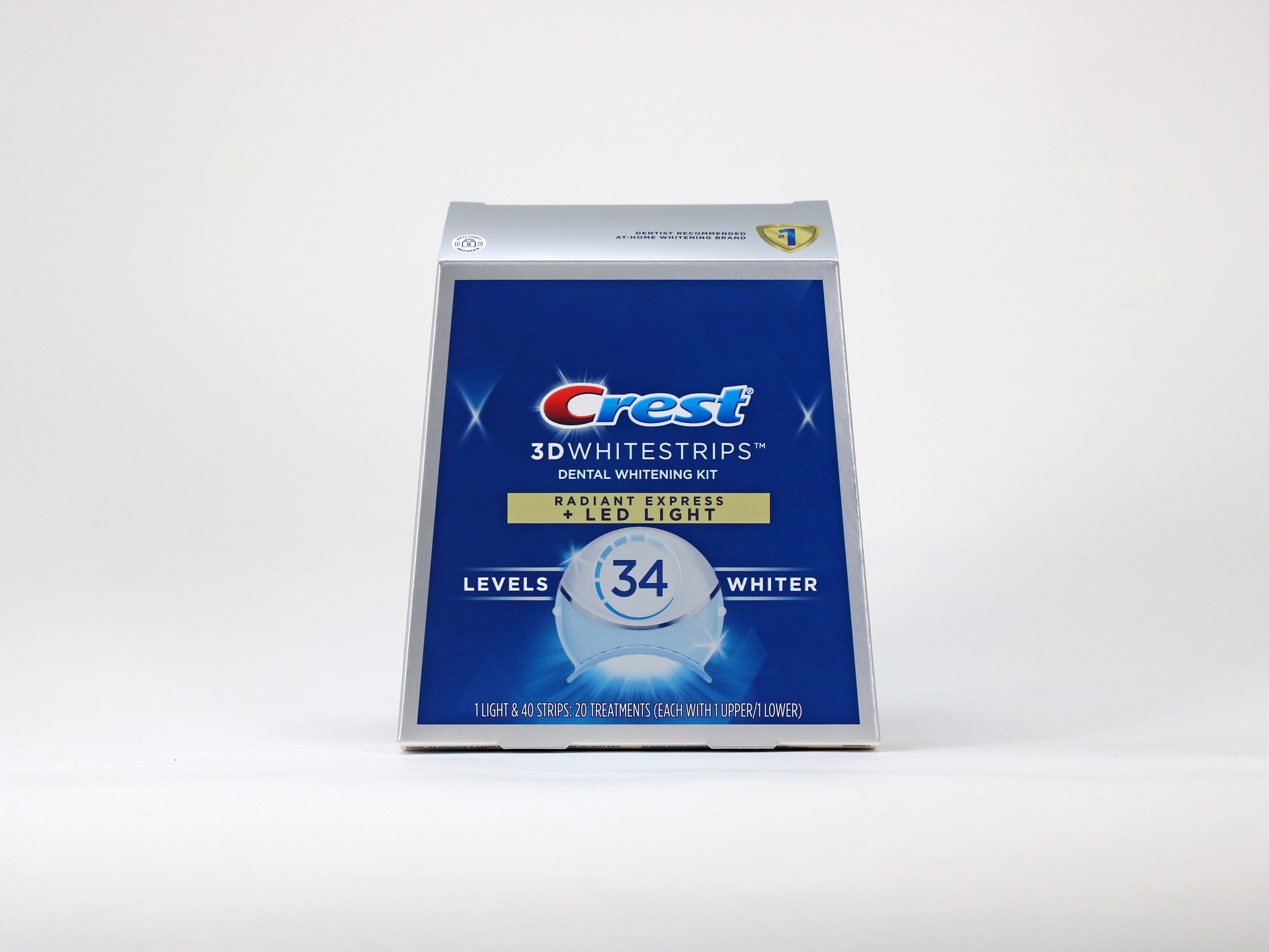 Crest 3D Whitestrips Radiant Express folding cartons feature soft touch coating, cold foiling, and embossing